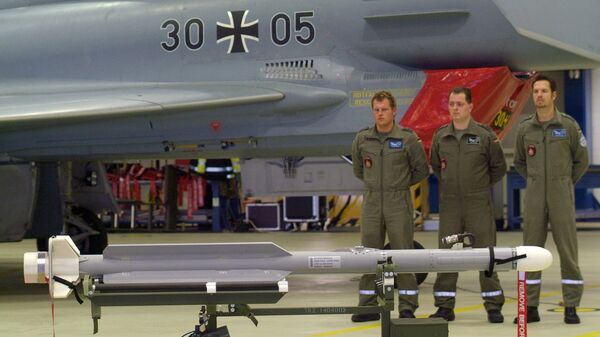 An IRIS-T Missile stands in front of an Eurofighter during an official ceremony at the airbase of Rostock-Laage, northern Germany, on Monday, Dec. 5, 2005. The German Luftwaffe put the Short Range Air-to-Air Missile IRIS-T official into service Monday, replacing old Sidewinder missiles. The air-to-air missiles can also be launched using ground-based platforms to serve as air defense systems. - Sputnik India