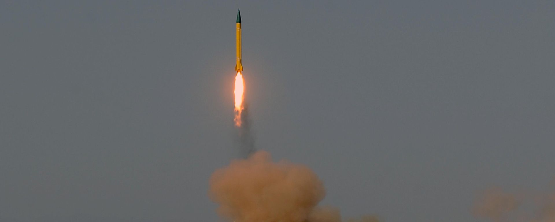 In this photo provided by the Iranian Students News Agency (ISNA), a surface-to-surface missile is launched during the Iranian Revolutionary Guards maneuver in an undisclosed location in Iran, Tuesday, July 3, 2012c  - Sputnik भारत, 1920, 12.07.2026