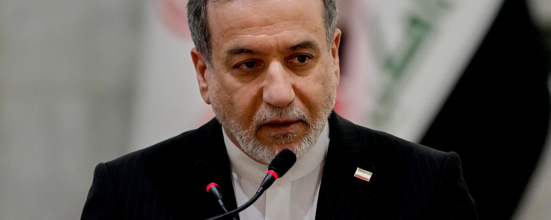 Iranian Foreign Minister Abbas Araghchi speaks during a news conference with his Iraqi counterpart Fouad Hussein after their meeting at the foreign ministry in Baghdad, Iraq, Sunday, June 28, 2026.  - Sputnik भारत, 1920, 28.06.2026