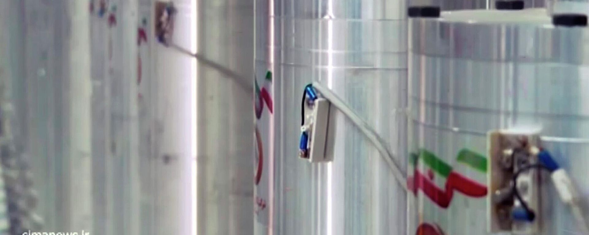 In this image made from April 17, 2021, video released by the Islamic Republic Iran Broadcasting, IRIB, state-run TV, various centrifuge machines line the hall damaged on Sunday, April 11, 2021, at the Natanz Uranium Enrichment Facility - Sputnik भारत, 1920, 03.07.2026