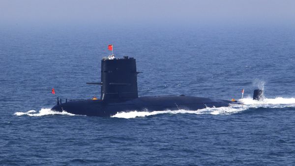 In this April 26, 2012 file photo released by China's Xinhua News Agency, Chinese navy's submarine attends the fleet review of the China-Russia joint naval exercise in the Yellow Sea - Sputnik भारत