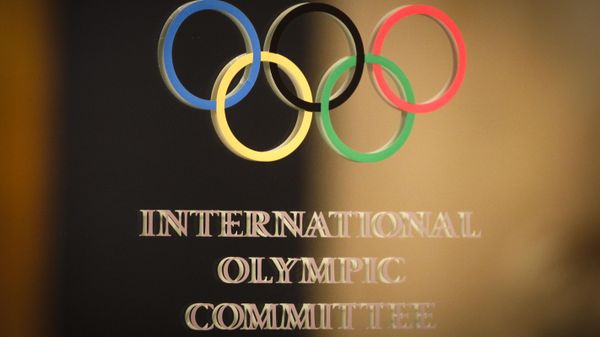 The International Olympic Committee (IOC) logo is seen on the door at a meeting of the IOC Executive Board at a hotel in London, prior to the 2012 Summer Olympics, Saturday, July 21, 2012 The International Olympic Committee (IOC) logo is seen on the door at a meeting of the IOC Executive Board at a hotel in London, prior to the 2012 Summer Olympics, Saturday, July 21, 2012 - Sputnik India