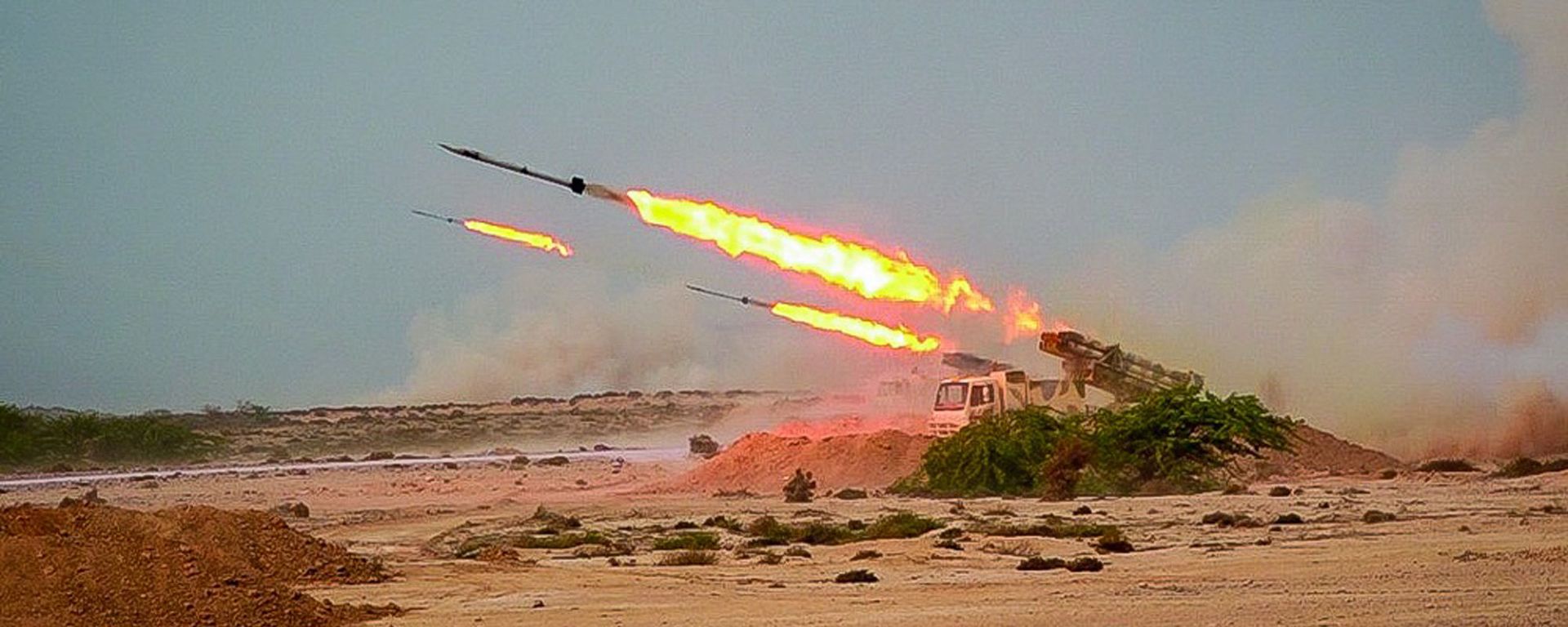 In this photo released Tuesday, July 28, 2020, by Sepahnews, missiles are fired in a Revolutionary Guard military exercise. Iran's paramilitary Revolutionary Guard fired a missile from a helicopter targeting the mock-up aircraft carrier in the strategic Strait of Hormuz. That's according to footage aired on state television on Tuesday. Iranian commandos also fast-roped down from a helicopter onto the replica in the footage from the exercise called Great Prophet 14. The drill appears aimed at threatening the U.S. amid tensions between Tehran and Washington. - Sputnik India, 1920, 08.07.2026