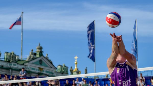 Maxim Sivolap in the semifinal match of the Russian Cup in men's beach volleyball against Ilya Leshukov and Oleg Stoyanovsky on Palace Square in St. Petersburg. Maxim Sivolap in the semifinal match of the Russian Cup in men's beach volleyball against Ilya Leshukov and Oleg Stoyanovsky on Palace Square in St. Petersburg. - Sputnik India