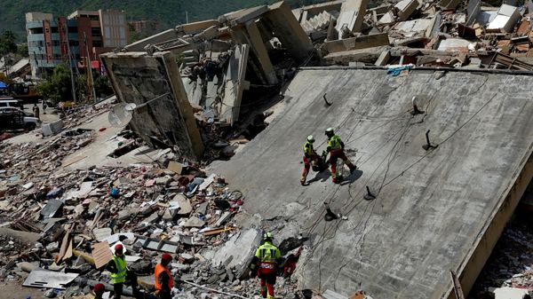 Mexican Army rescue workers search for people trapped in collapsed buildings after earthquakes struck La Guaira, Venezuela, Sunday, June 28, 2026.  - Sputnik India