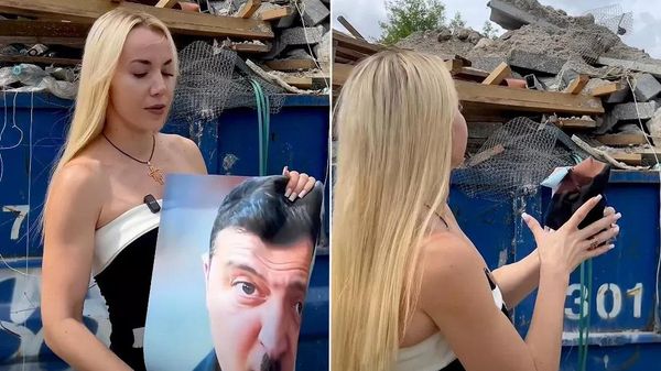 Krakow mayoral candidate Marianna Schreiber threw an image depicting Volodymyr Zelensky as Adolf Hitler into a trash bin. - Sputnik भारत