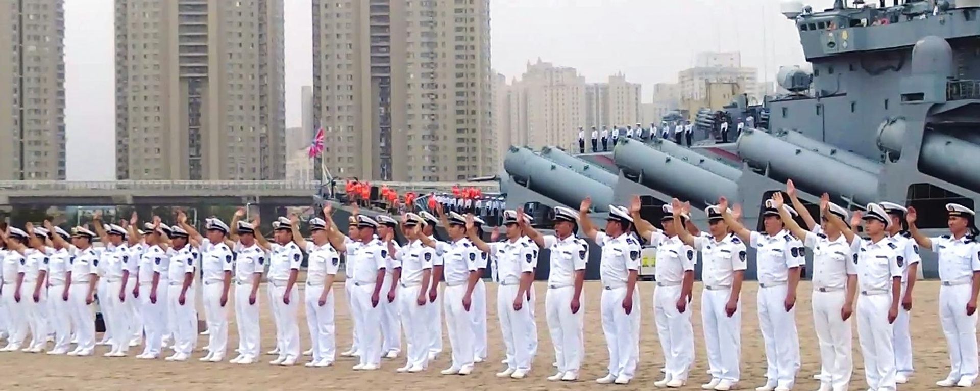 The closing ceremony of the Russia-China joint naval exercise Maritime Interaction 2026 (video screenshot). The Russian Pacific Fleet’s Guards missile cruiser Varyag is seen in the background. - Sputnik India, 1920, 17.07.2026