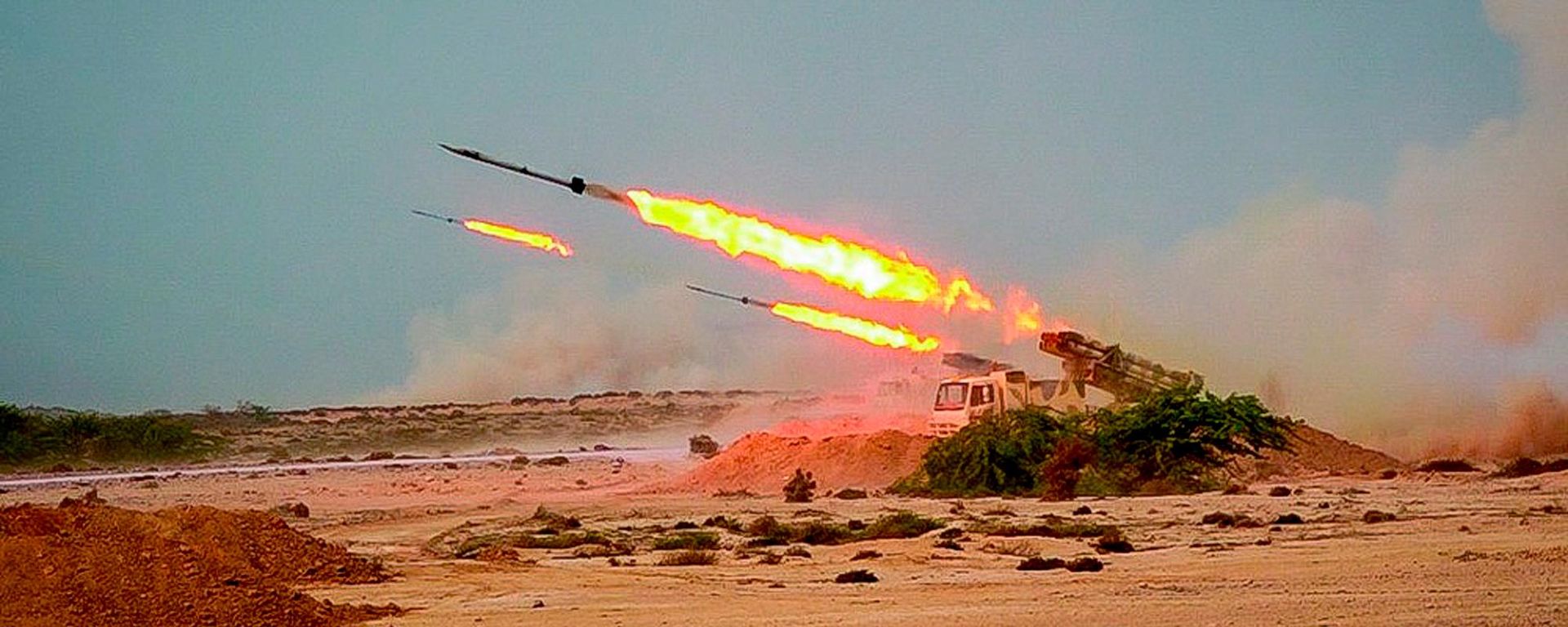 In this photo released Tuesday, July 28, 2020, by Sepahnews, missiles are fired in a Revolutionary Guard military exercise - Sputnik India, 1920, 16.07.2026