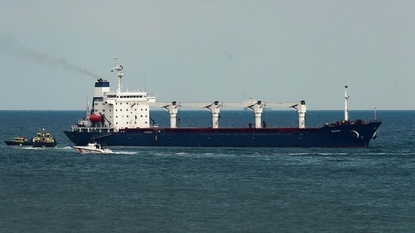 A boat with Russian, Ukrainian, Turkish and U.N. officials heads to the Sierra Leone-flagged cargo ship Razoni, to check if the grain shipment is in accordance with a crucial agreement signed last month by Moscow and Kyiv, at an inspection area in the Black Sea off the coast of Istanbul, Turkey, Wednesday, Aug. 3, 2022 - Sputnik India