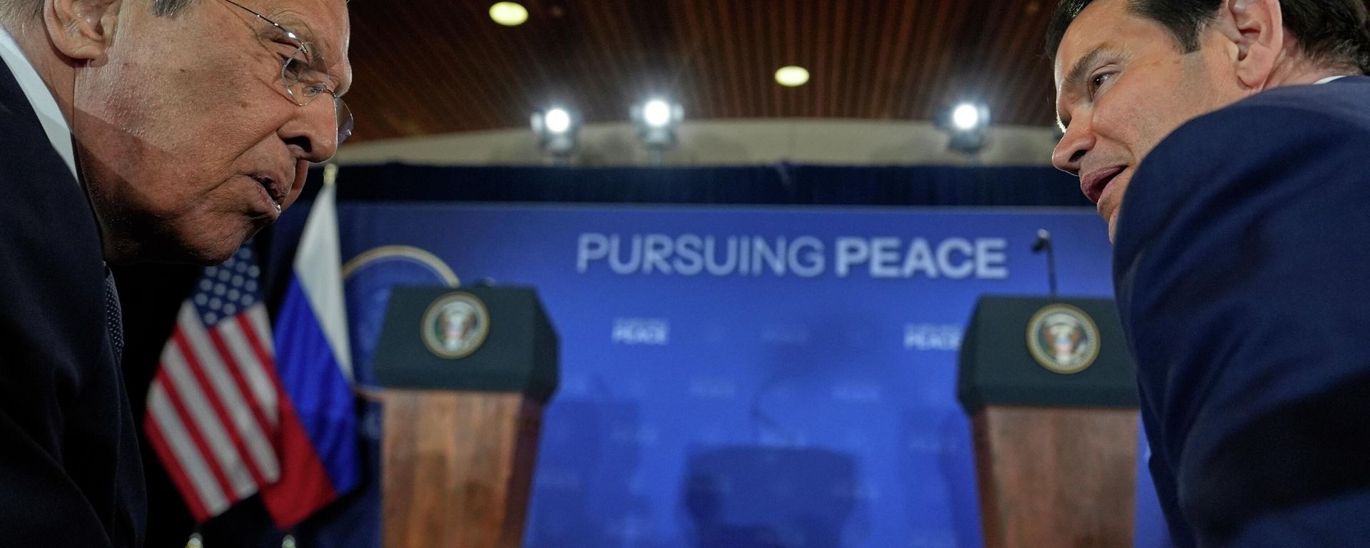 Russia's Foreign Minister Sergey Lavrov and Secretary of State Marco Rubio talks before a news conference with President Donald Trump and Russia's President Vladimir Putin at Joint Base Elmendorf-Richardson, Alaska, Friday, Aug. 15, 2025. - Sputnik India, 1920, 23.07.2026