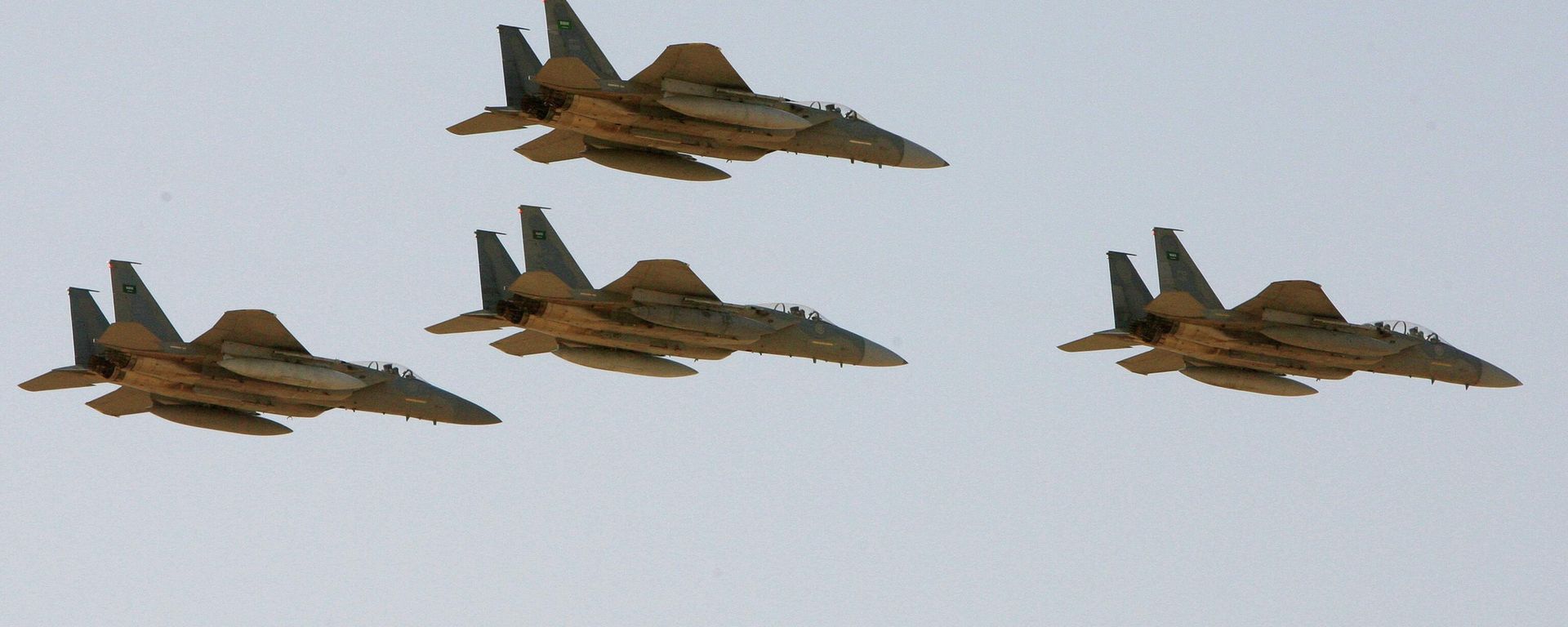In this photo taken Sunday, Jan. 25, 2009, F-15 warplanes of the Saudi Air Force fly over the Saudi Arabian capital Riyadh during a graduation ceremony at King Faisal Air Force University - Sputnik India, 1920, 25.07.2026