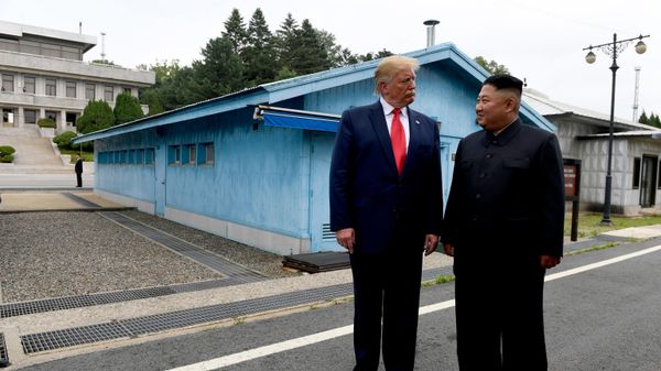 In this June 30, 2019, file photo, US President Donald Trump, left, meets with North Korean leader Kim Jong-un at the border village of Panmunjom in Demilitarized Zone, South Korea - Sputnik India