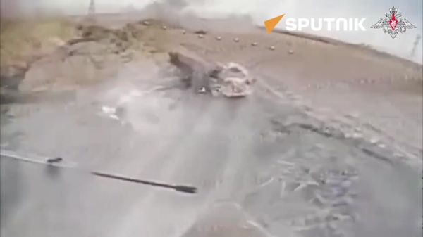 Russian soldiers destroy Ukrainian Leopard battle tank with drone salvo - Sputnik India