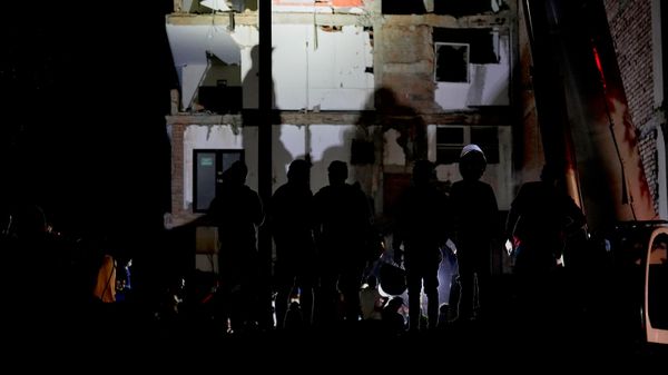 Rescue workers and residents search through the rubble after an earthquake struck Pereira, Colombia, Monday, Aug. 10, 2026. - Sputnik India