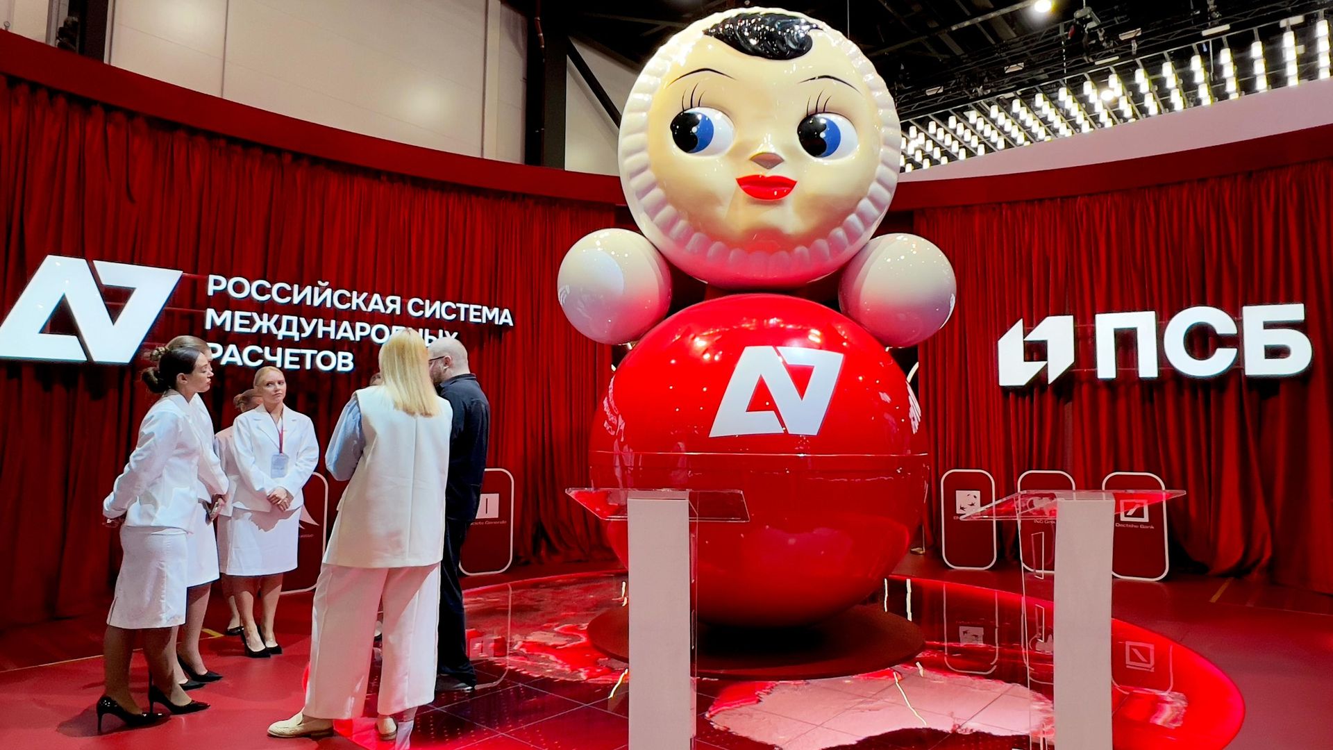 Promsvyazbank A7 logo on a nevalyashka (lit. 'un-fall-able') doll. at SPIEF-2026. Promsvyazbank A7 logo on a nevalyashka (lit. 'un-fall-able') doll. at SPIEF-2026. - Sputnik India, 1920, 12.08.2026