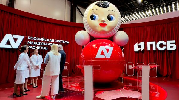 Promsvyazbank A7 logo on a nevalyashka (lit. 'un-fall-able') doll. at SPIEF-2026. - Sputnik India