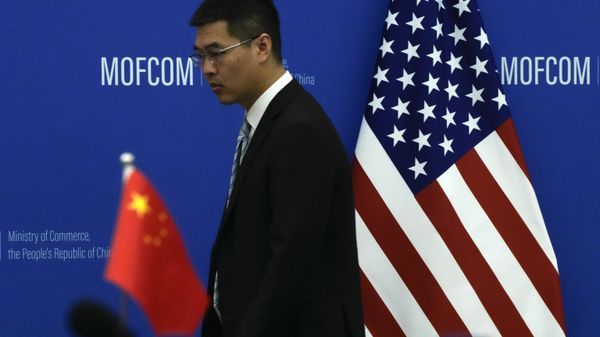 The China and US national flags before a meeting between Commerce Secretary Gina Raimondo and Chinese Minister of Commerce Wang Wentao at the Ministry of Commerce - Sputnik भारत