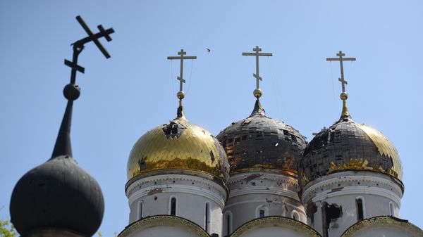 A view shows domes of the Holy Assumption Cathedral of the Saint Nicholas and Basil's Convent - Sputnik भारत