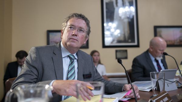 Rep. Thomas Massie, R-Ky., listens as the House Rules Committee prepares a bill to reverse a Biden administration firearms-related regulation on so-called pistol braces, a stabilizing feature championed by some members of the conservative House Freedom Caucus, at the Capitol in Washington, Monday, June 12, 2023 - Sputnik भारत