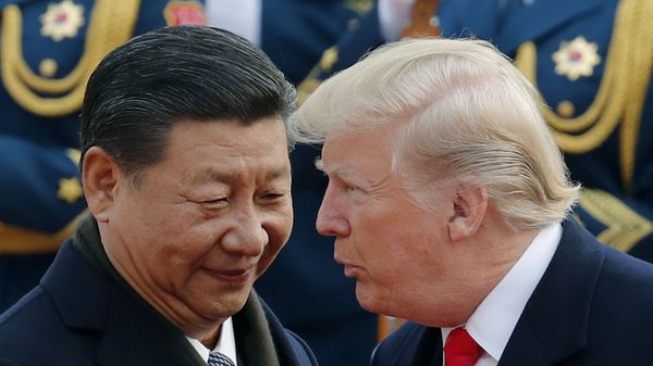 FILE - In this Nov. 9, 2017, file photo, U.S. President Donald Trump, right, chats with Chinese President Xi Jinping during a welcome ceremony at the Great Hall of the People in Beijing - Sputnik भारत