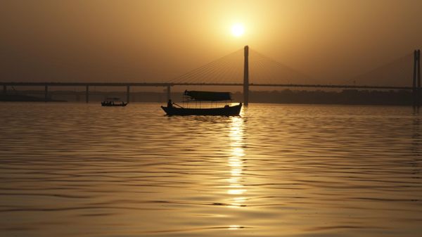 A boatman rows on the river Ganges at sunset in Prayagraj, India, Monday, March 28, 2022. The river is considered sacred by Hindus. - Sputnik India
