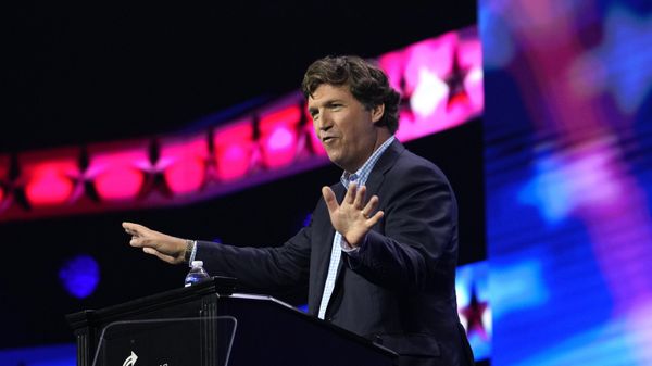 Tucker Carlson speaks at the Turning Point Action conference, Saturday, July 15, 2023, in West Palm Beach, Fla.(AP Photo/Lynne Sladky) - Sputnik India