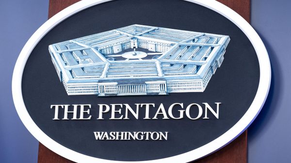 The US Department of Defense logo is seen on the wall in the Press Briefing room at the Pentagon, Oct. 29, 2024, in Washington. - Sputnik India