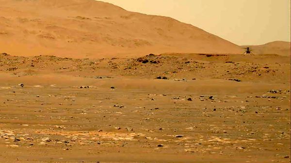 In this April 30, 2021, file image taken by the Mars Perseverance rover and made available by NASA, the Mars Ingenuity helicopter, right, flies over the surface of the planet. Japanese space agency scientists said Thursday, Aug. 19, 2021 they planned to bring soil samples from the Mars region back to Earth ahead of the U.S. Perseverance and Chinese missions now operating on the planet. - Sputnik भारत