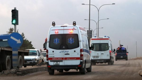 Ambulances leave the King Abdullah bin Al Hussein Training Center where a Jordanian policeman went on a shooting spree in Mwaqar on the outskirts of Amman, Jordan, Monday, Nov. 9, 2015. - Sputnik भारत